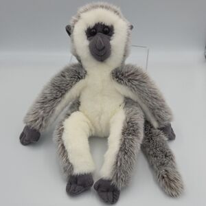 Gray and White Stuffed Monkey Toy